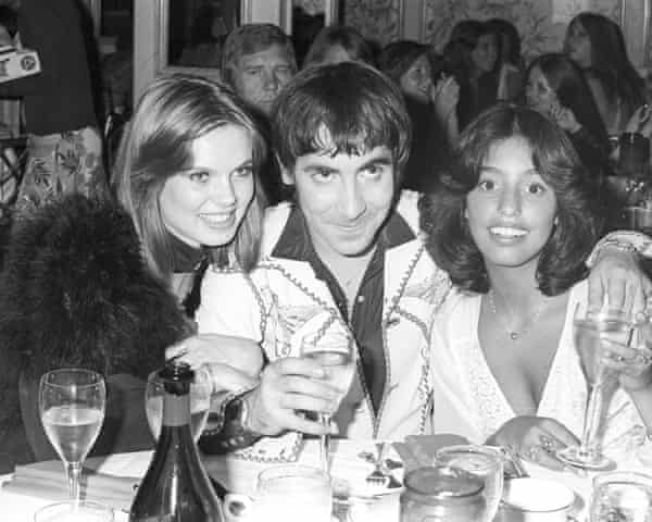 Keith Moon, drummer with the Who, pictured in 1974 with girlfriend Annette Walter-Lax, left and Lori Mattix.