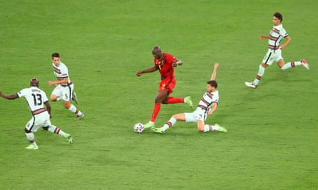 Romelu Lukaku runs at the Portugal defence during the 1-0 last-16 win.
