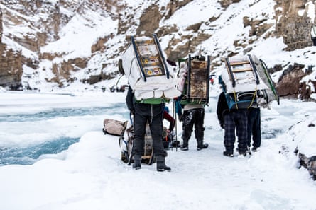 Porters carrying packs.