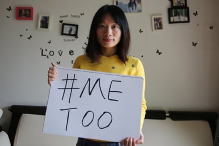 Sophia Huang Xueqin holds up a sign reading ‘#MeToo’
