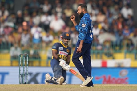 England’s Adil Rashid celebrates the wicket of Sri Lanka’s captain Charith Asalanka