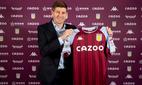 Steven Gerrard holds an Aston Villa shirt after his appointment was announced on Thursday.