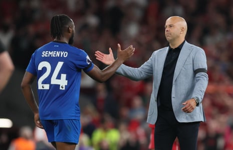 Antoine Semenyo greets Arne Slot after the final whistle at Anfield last night.