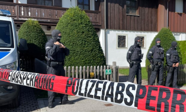 German police outside the lakeside residence of Alisher Usmanov in Bavaria