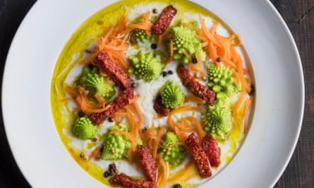 ‘Quick-pickled carrots add crunch to the creamy depths of the soup’: cauliflower soup with pickled carrot and salami.