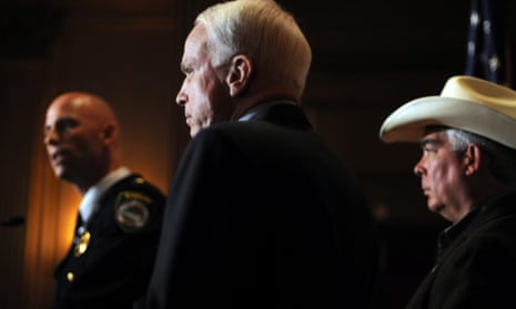 John McCain, seen on Capitol Hill with law enforcement officers in April 2010.