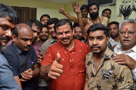 T Raja Singh gestures after he was released by a court on bail in Hyderabad following his arrest