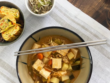 Stainless Steel Chopsticks with a bowl of soup