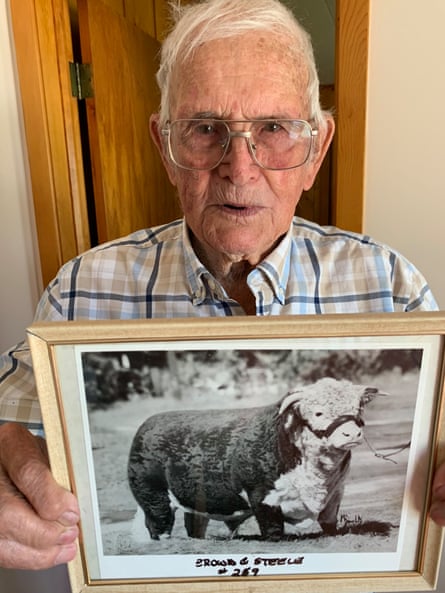 a man holding a photo