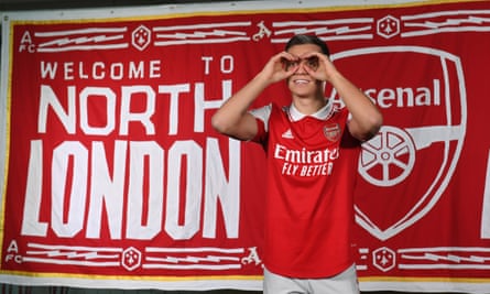 Leandro Trossard poses at Arsenal’s training ground after completing his move.