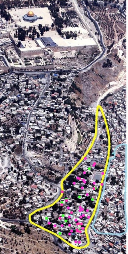 Overhead view of al-Bustan with red and green dots.
