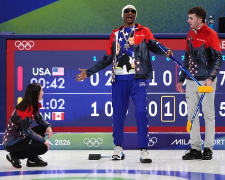 Snoop Dogg curls alongside Cory Thiesse and partner Korey Dropkin