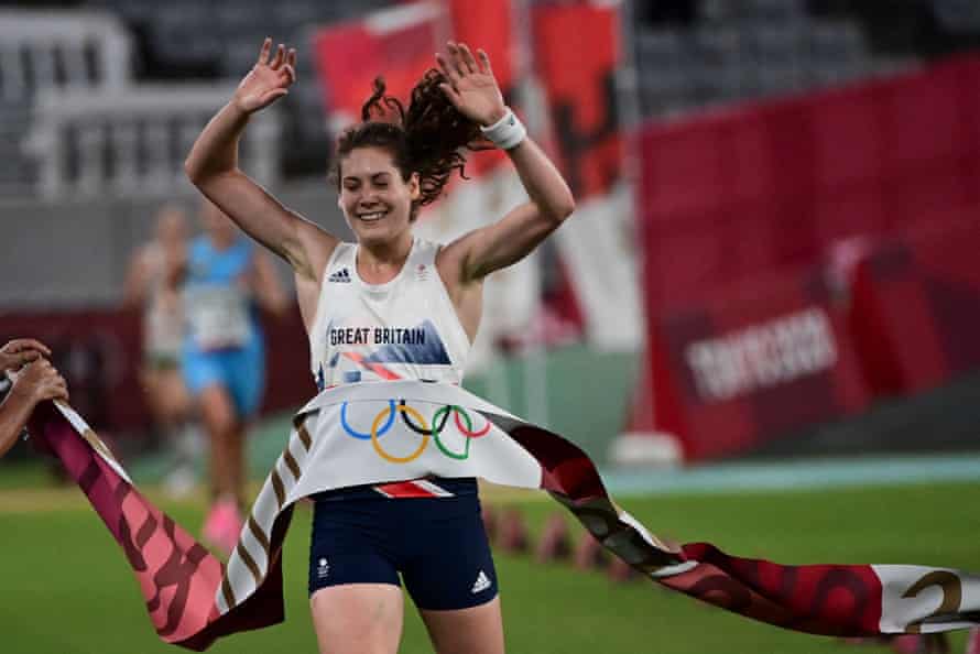 Kate French crosses the finish line to win the modern pentathlon.