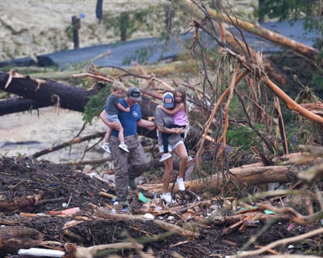Texas begins grim flood recovery after dozens killed and scores still missing – including children
