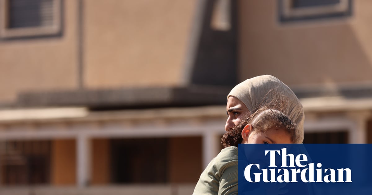 Israeli militants besiege two Palestinian families in their West Bank homes