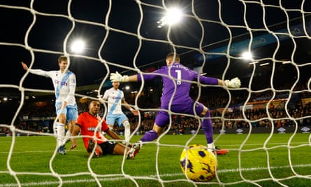 Luton Town’s Jacob Brown scores their second goal past Crystal Palace’s Sam Johnstone.