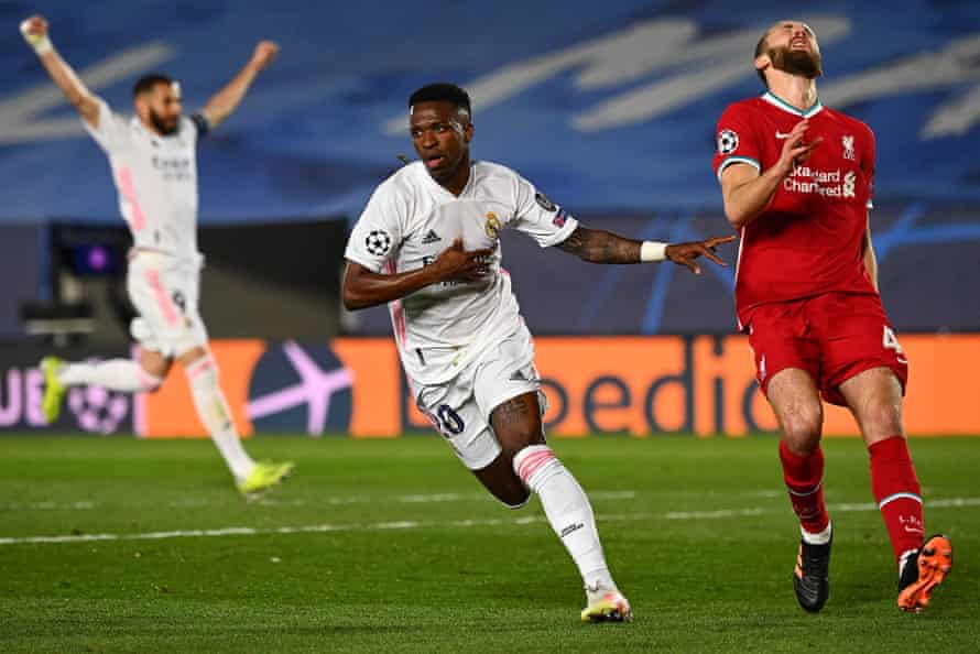 Vinícius Júnior celebrates after scoring one of his two goals for Real Madrid against Liverpool in last season’s Champions League quarter-final first leg.