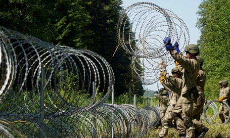 Lithuanian army soldiers installing razor wire on the border with Belarus in Druskininkai last month.