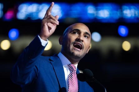 a man speaks into a microphone