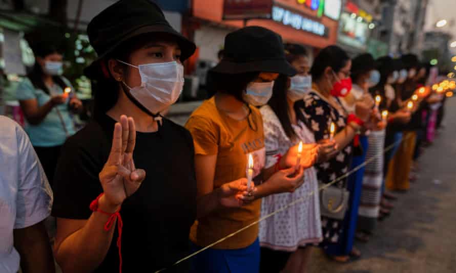 Demonstrators light candles during a protest against the military coup in Yangon, Myanmar, on Tuesday.