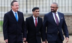 Foreign secretary David Cameron, prime minister Rishi Sunak and home secretary James Cleverly arrive to attend a ceremonial welcome for the South Korean president in central London on 21 November.