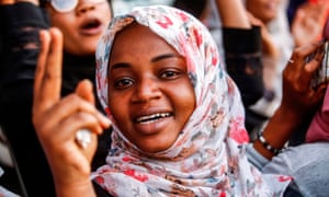 A Sudanese woman chants slogans during a demonstration outside the army headquarters in the capital Khartoum.