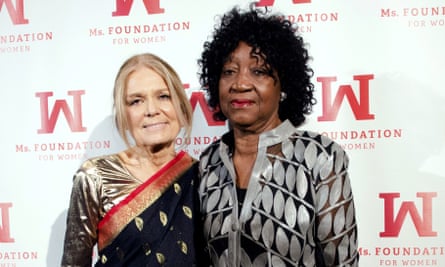 Hughes with Steinem in 2014.