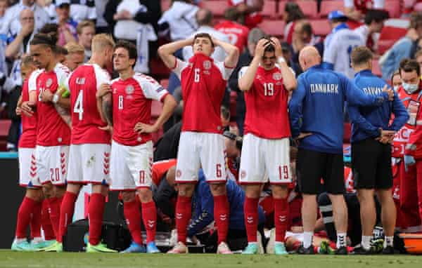 Denmark's footballers shield Christian Eriksen