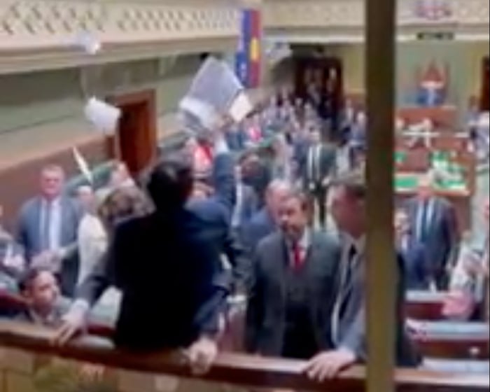 Australian politics live: Climate protester restrained after interrupting NSW parliament; Liberal says PM should be ‘stoned in the square’ over ATO credit card ban