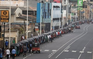 Colombo, Sri Lanka: Three-wheelers queue to buy petrol during a severe fuel shortage amid the country’s economic crisis