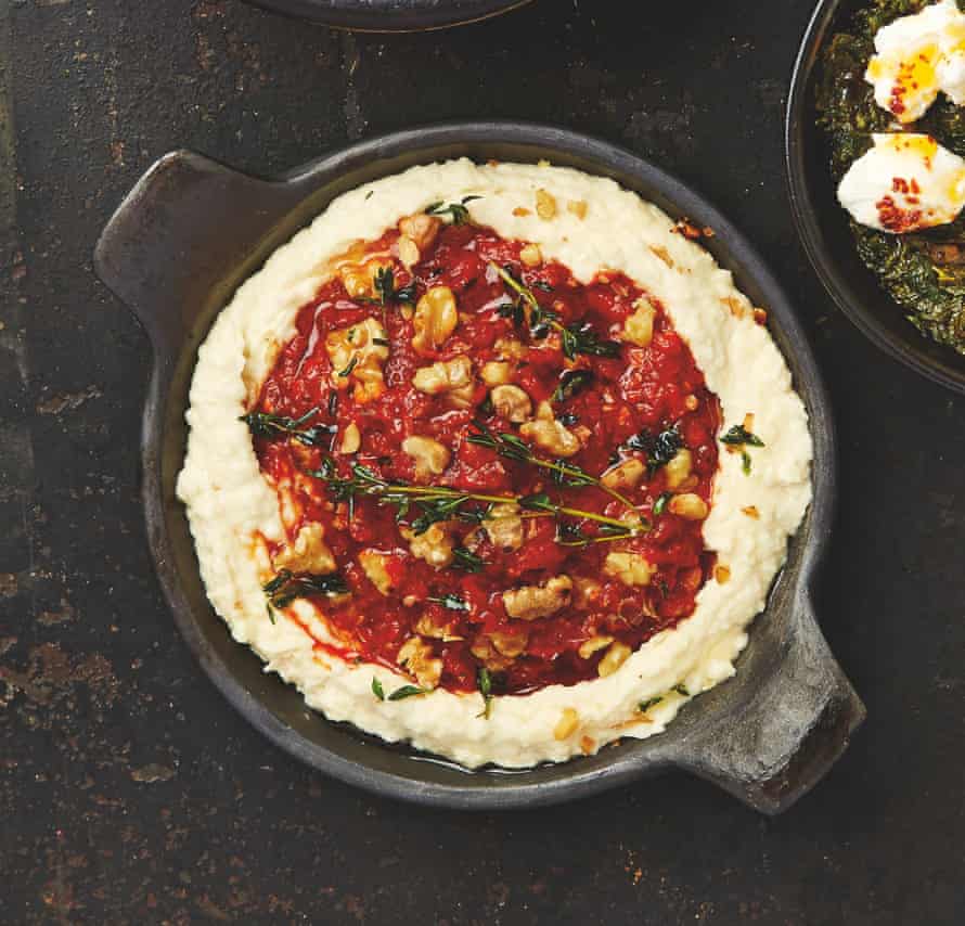 Yotam Ottolenghi’s butterbean hummus with red pepper and walnut paste.