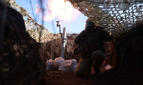 Ukrainian troops fire mortars from a position near Bakhmut on Friday