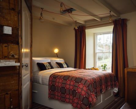 The farm’s four bedrooms feature furniture repurposed from London’s Dorchester hotel. Pictured is one of the bedrooms.
