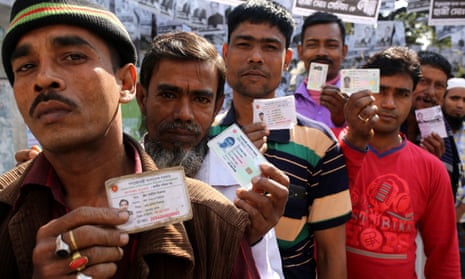 Voters queue outside a polling station in Dhaka on Sunday.