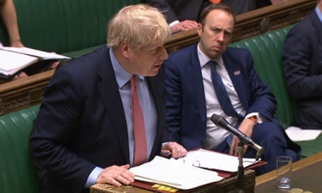 Boris Johnson and Matt Hancock in the Commons on Wednesday. Both have tested positive.