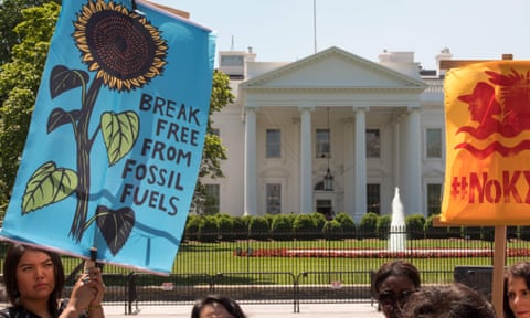 A group of Native American activists hold a news conference in front of the White House Friday.