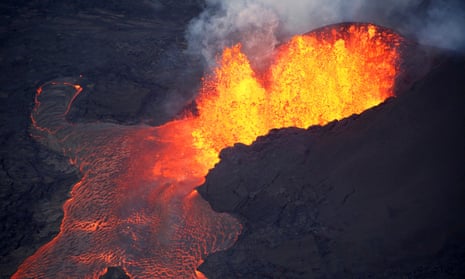 Lava erupts in Leilani Estates during ongoing eruptions of the Kilauea volcano in Hawaii 5 June 2018. 