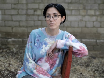 Kateryna Pereverzeva sitting on chair