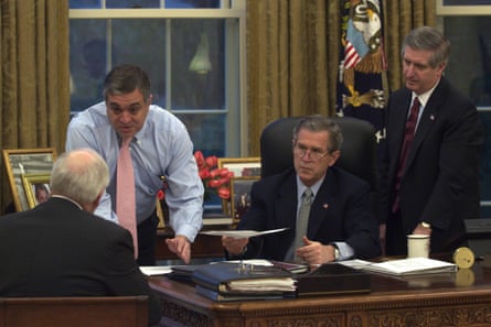 Cheney and Bush in the Oval Office, with two other US officials