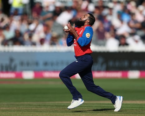 Adil Rashid of England takes a catch off of his own bowling to dismiss Abhishek Sharma of India.