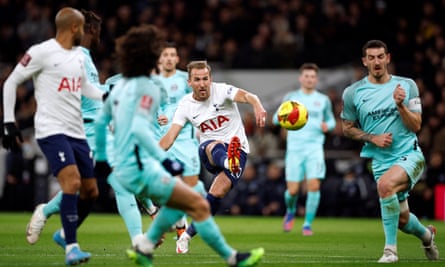 Tottenham’s Harry Kane scores their first goal against Brighton in the FA Cup