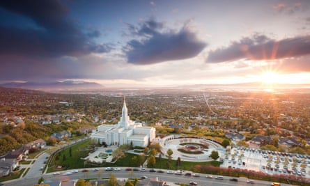 The Mormon Temple in Bountiful Utah sits above the Great Salt Lake at dusk.