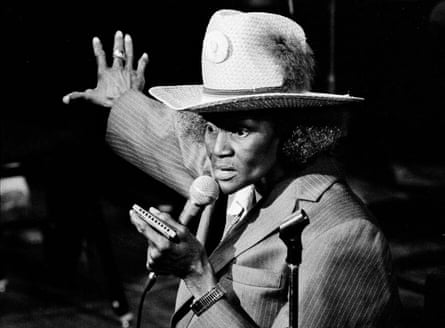 Big Mama Thornton performs in a huge Stetson and man’s suit.