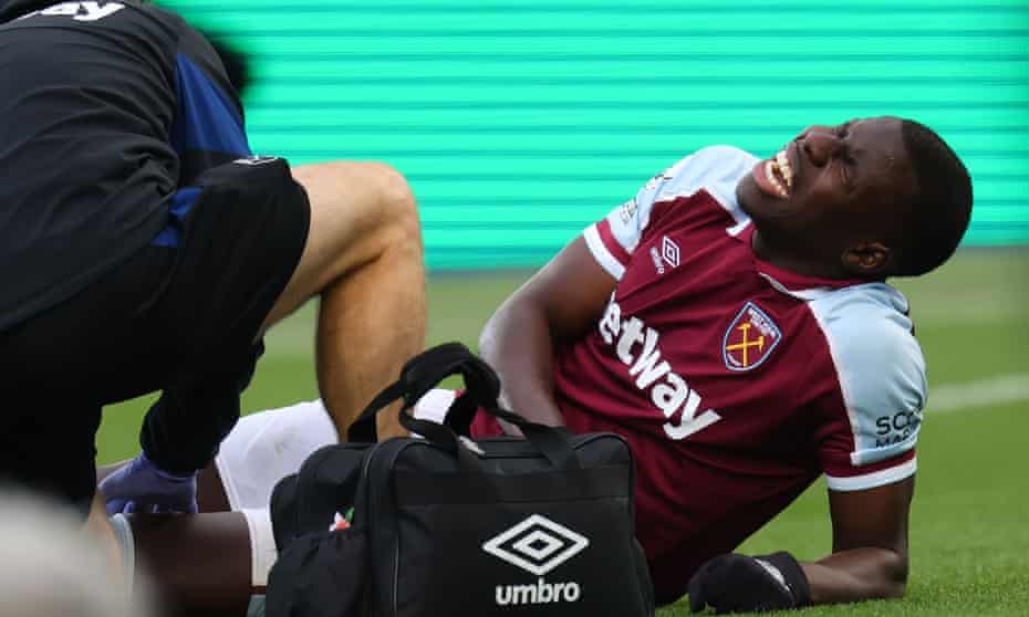 Kurt Zouma goes down injured during West Ham’s win over Chelsea.