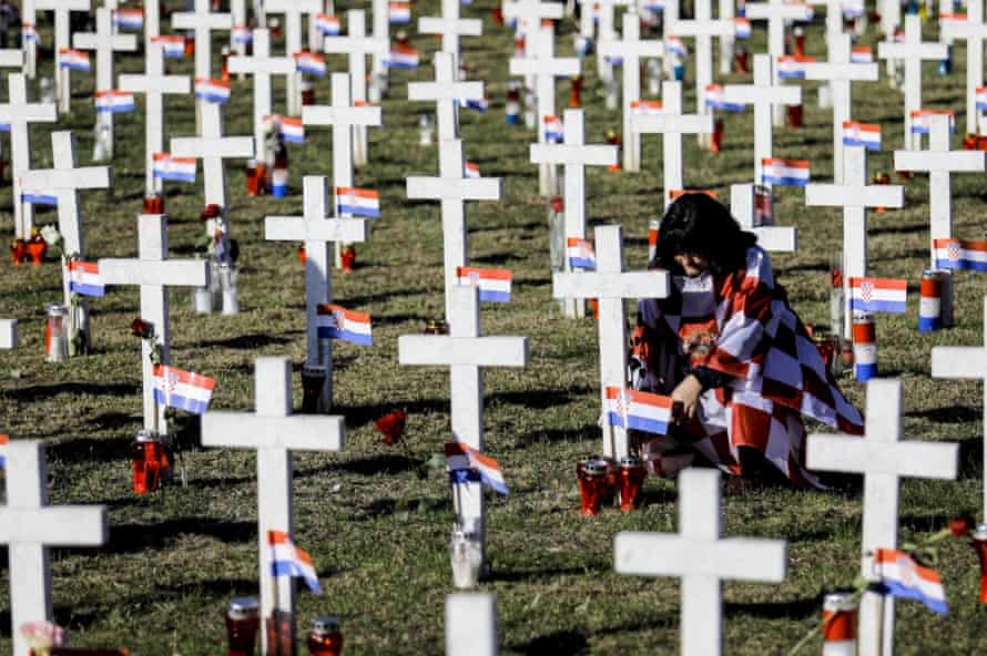 Relatives of victims take part in a commemoration ceremony on the anniversary of the Vukovar massacre.