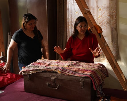 The Sohoni family displays Bradman’s cap before auction.