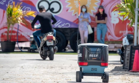 A robot delivering orders from Reef, a network of neighborhood kitchens in Miami, Florida.