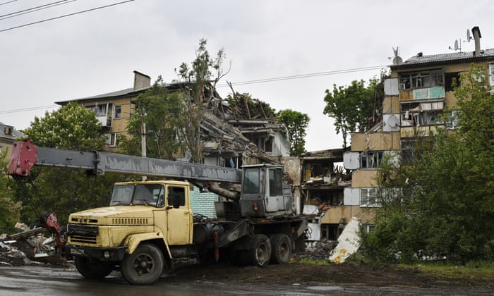 Rescuers work at a site of an apartment building destroyed by Russian shelling in Bakhmut, Donetsk region, Ukraine.