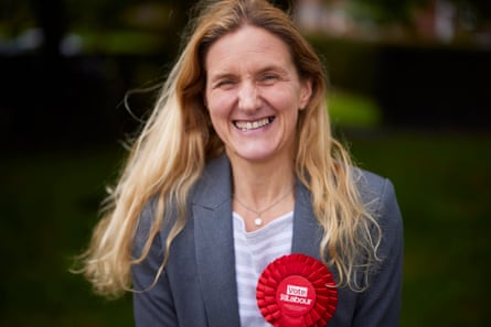 Leadbetter smiling and wearing a ‘Vote Labour’ rosette