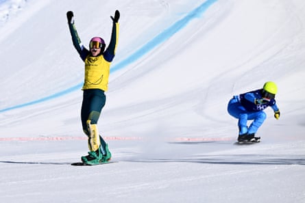 Josie Baff of Australia celebrates after winning gold in the women’s snowboard cross final.